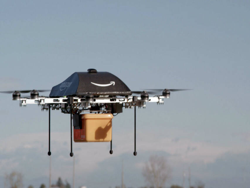 Amazon drone bot flying with package