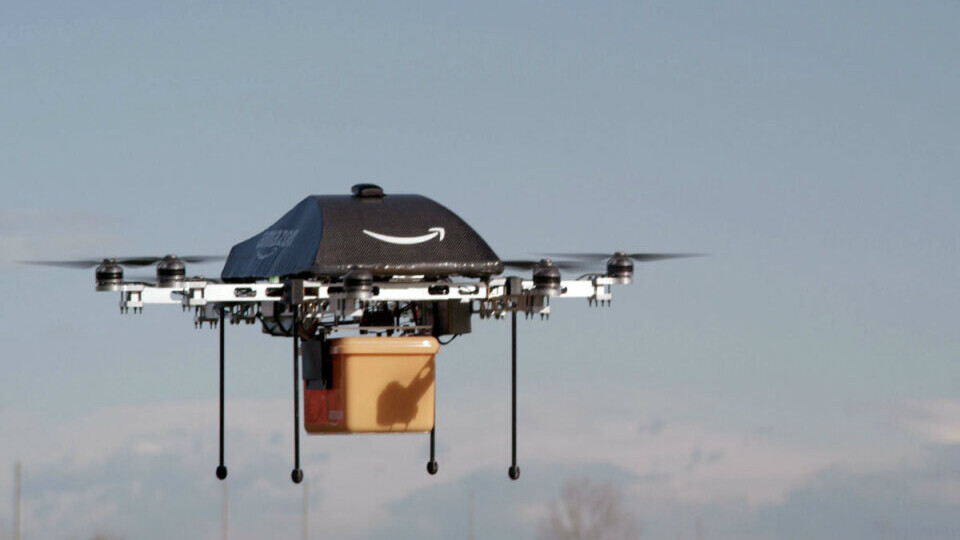 Amazon drone bot flying with package